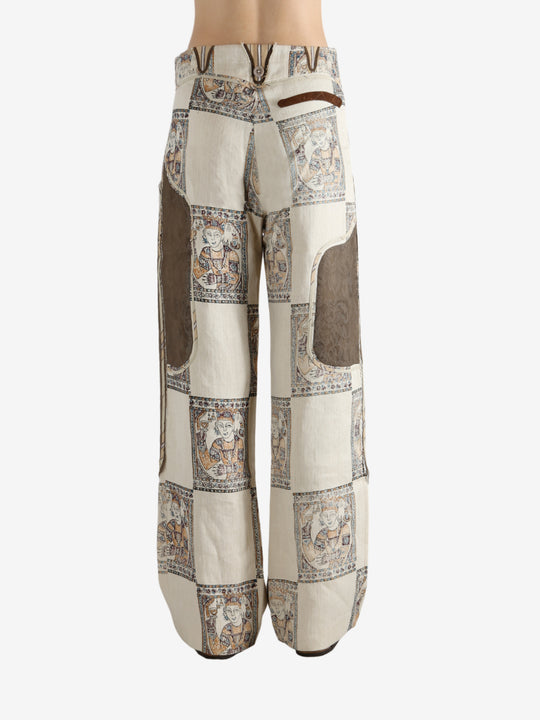 Grey pants, worn by a person, showing the pants's fit