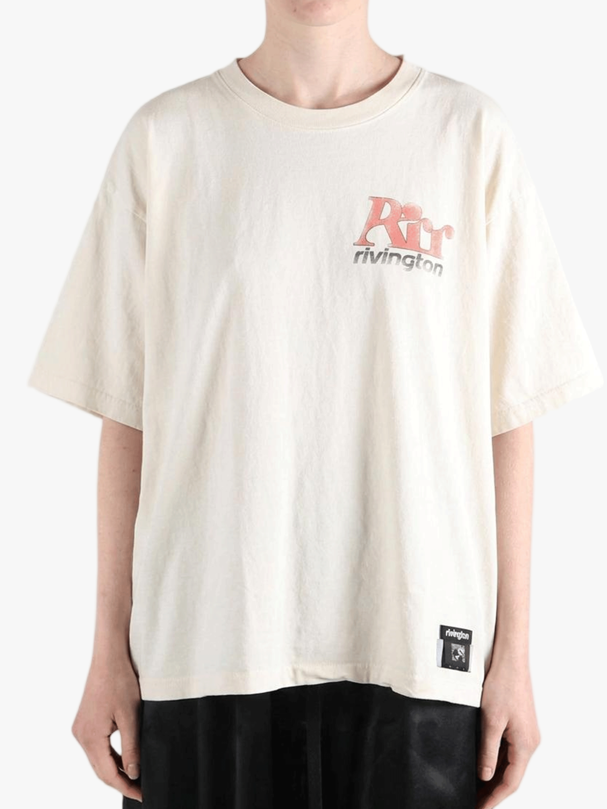 White t-shirt worn by a person, showing the t-shirt fit