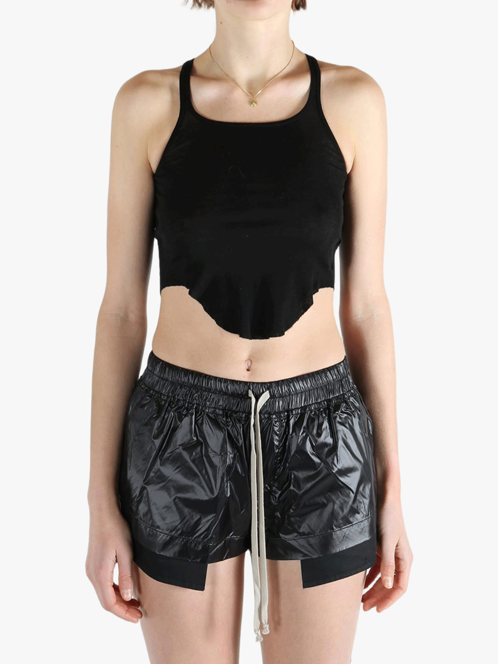 Black top worn by a person, showing the top's fit