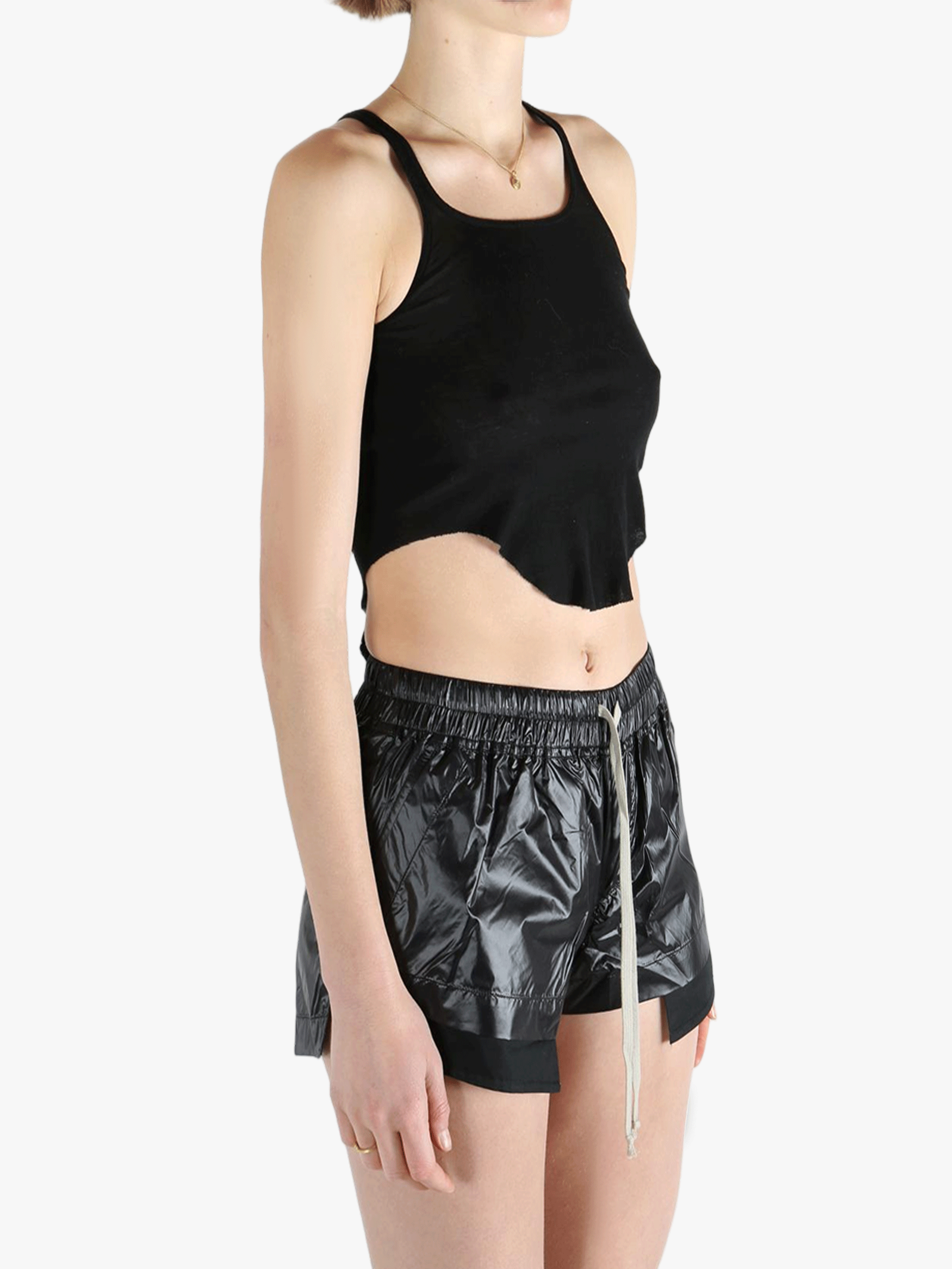 Black top worn by a person, showing the top's fit