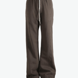 Brown pants worn by a person, showing the pants's fit