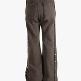 Brown pants worn by a person, showing the pants's fit