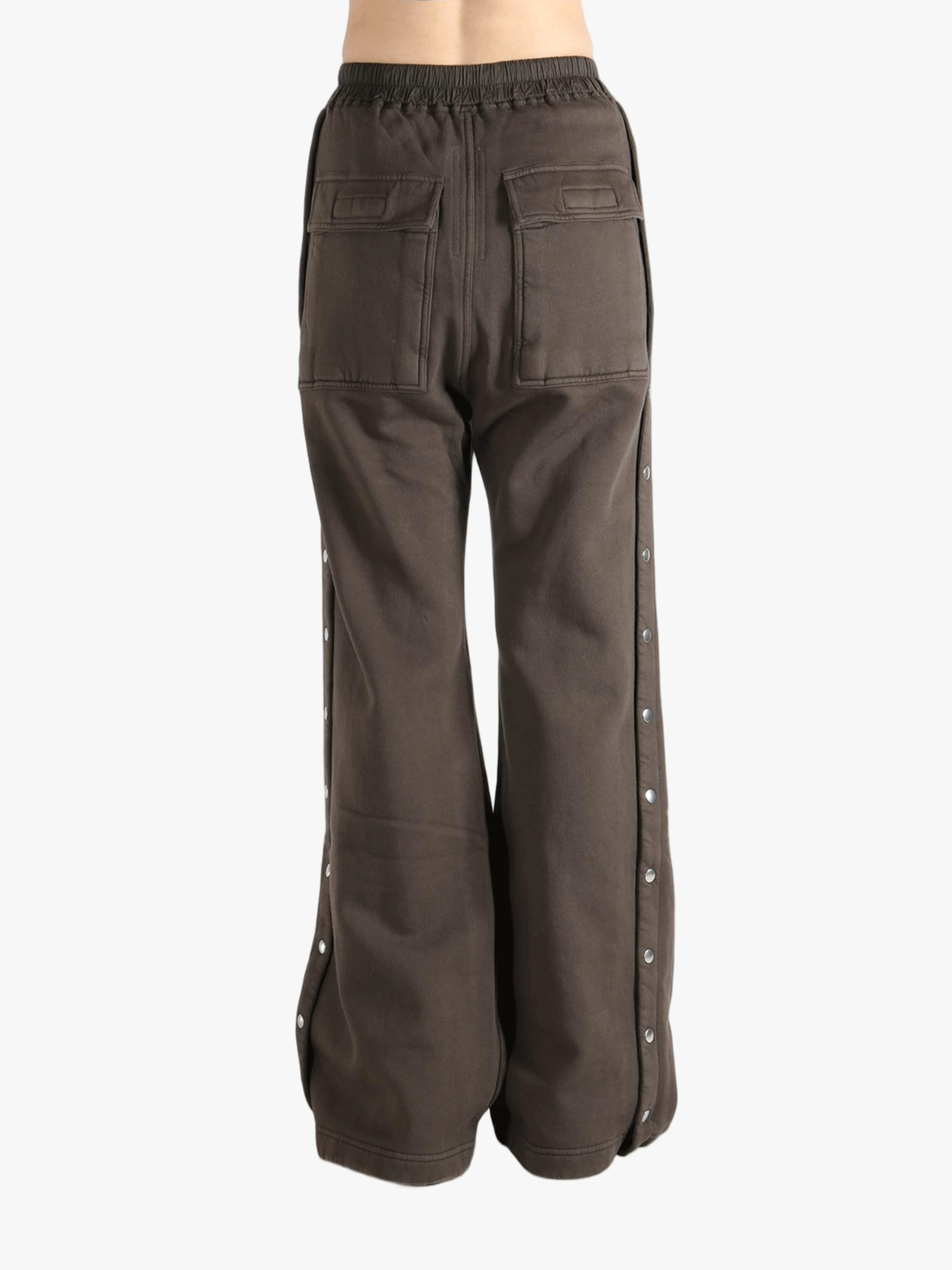 Brown pants worn by a person, showing the pants's fit