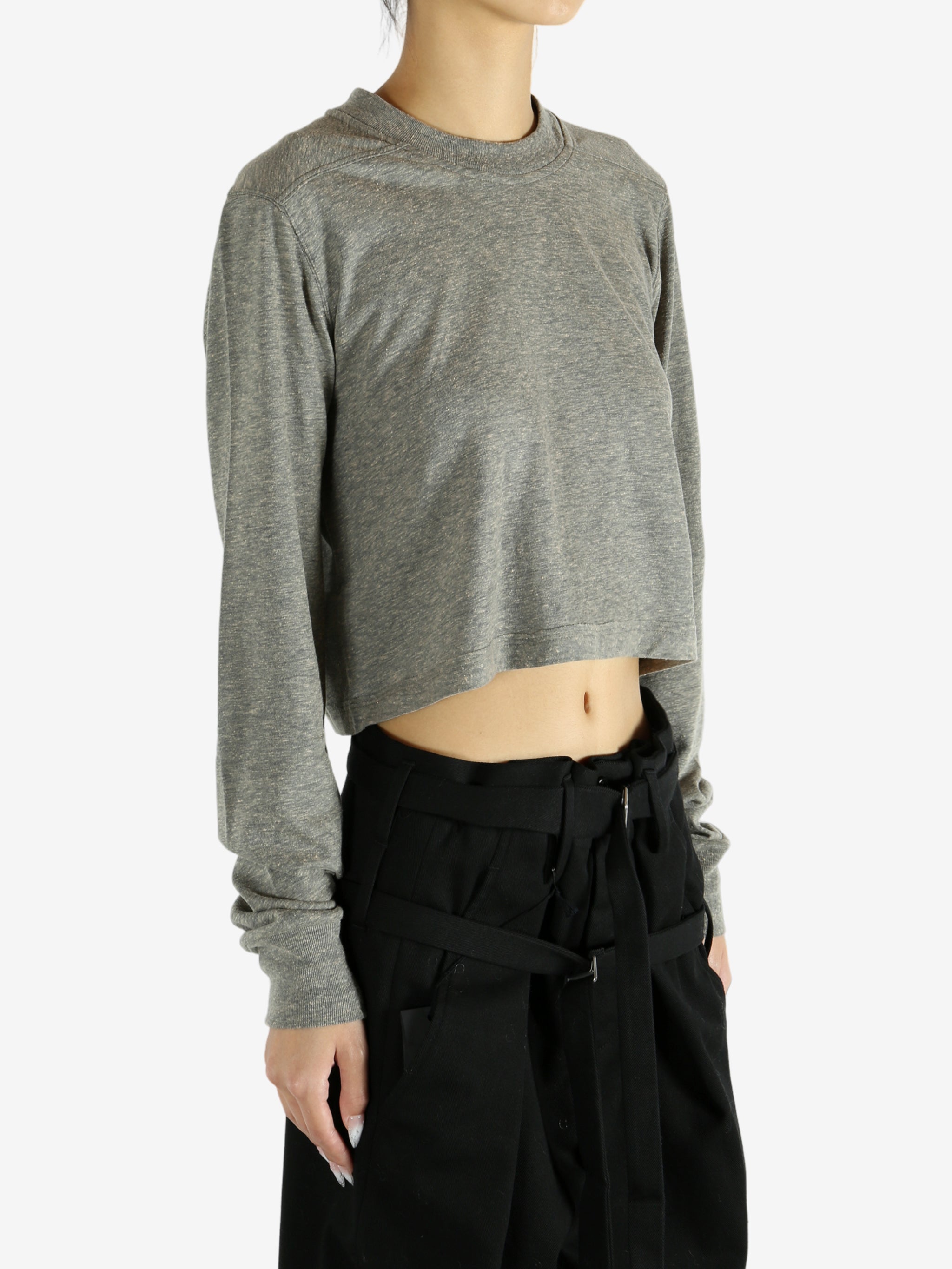 Grey t-shirt worn by a person, showing the shirt's fit