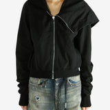 black jacket worn by a person, showing the jacket fit