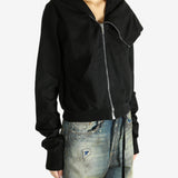 black jacket worn by a person, showing the jacket fit