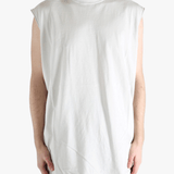 White shirt worn by a person, showing the shirt's fit