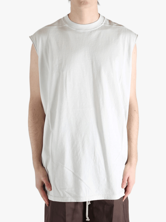 White shirt worn by a person, showing the shirt's fit