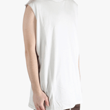 White shirt worn by a person, showing the shirt's fit