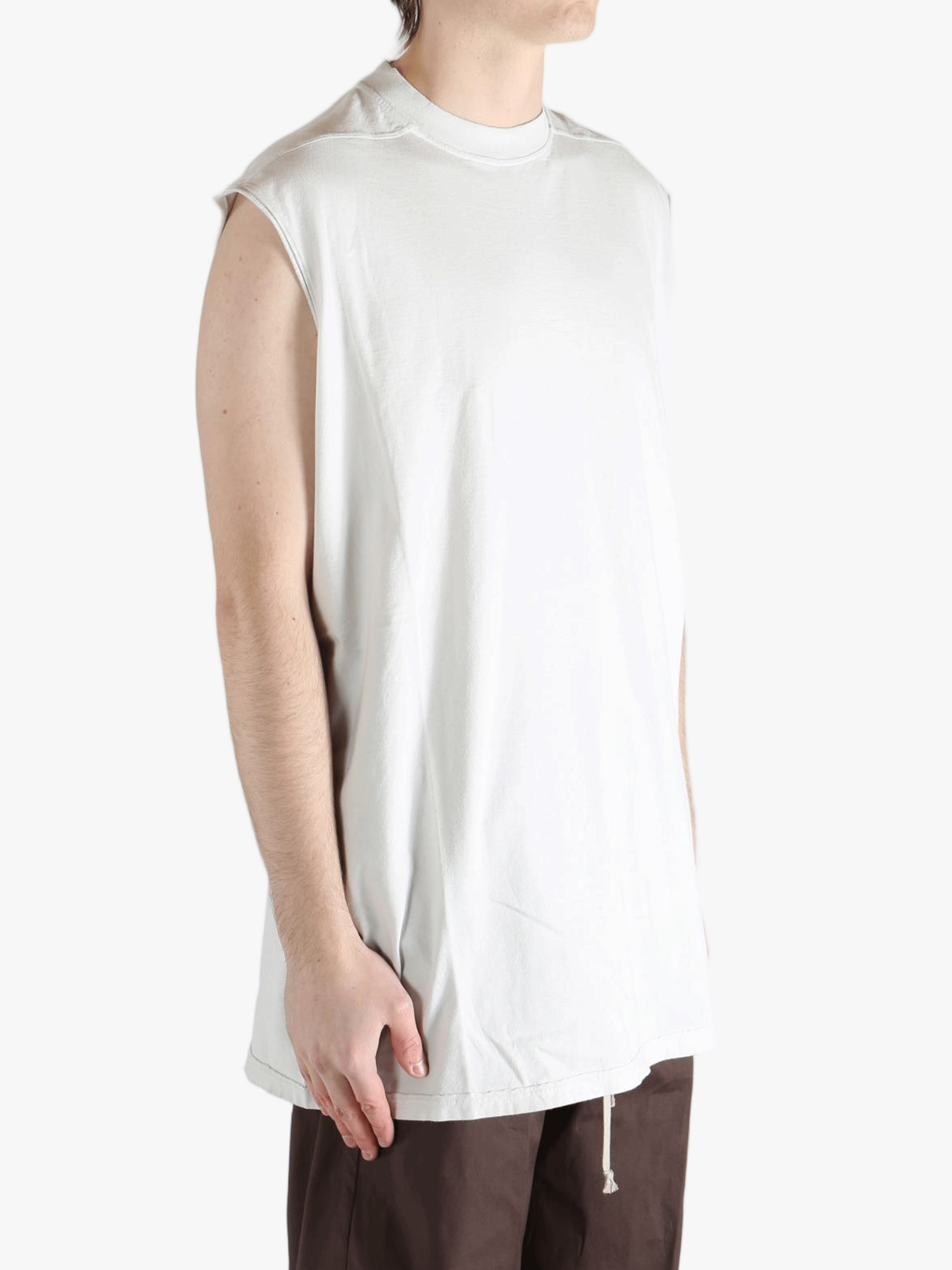 White shirt worn by a person, showing the shirt's fit