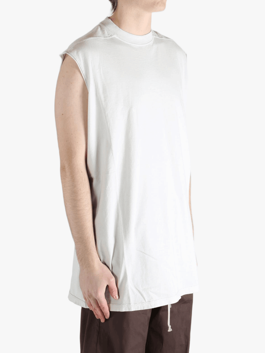 White shirt worn by a person, showing the shirt's fit