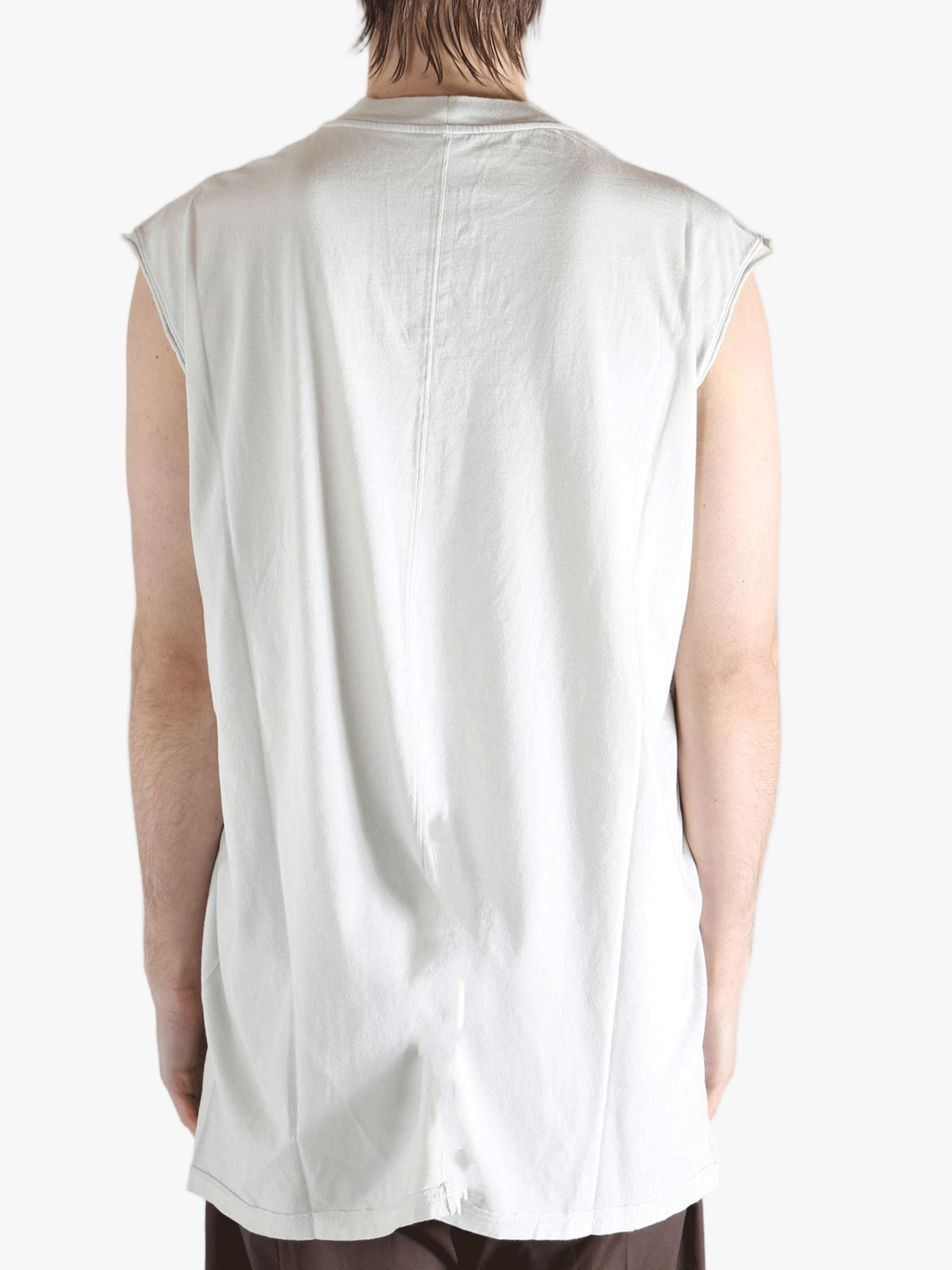 White shirt worn by a person, showing the shirt's fit