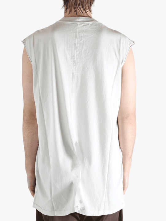 White shirt worn by a person, showing the shirt's fit