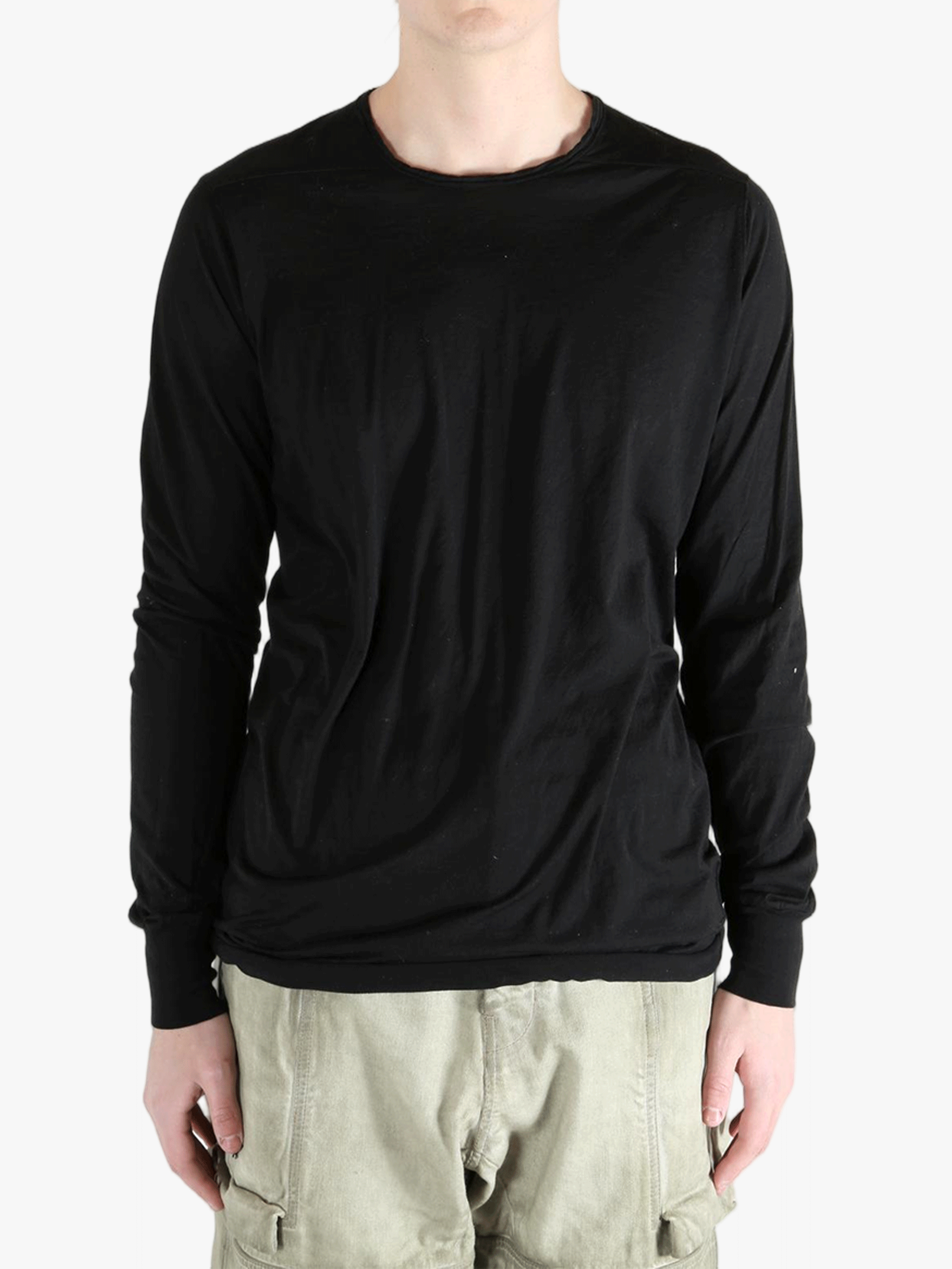 Black t-shirt worn by a person, showing the t-shirt fit