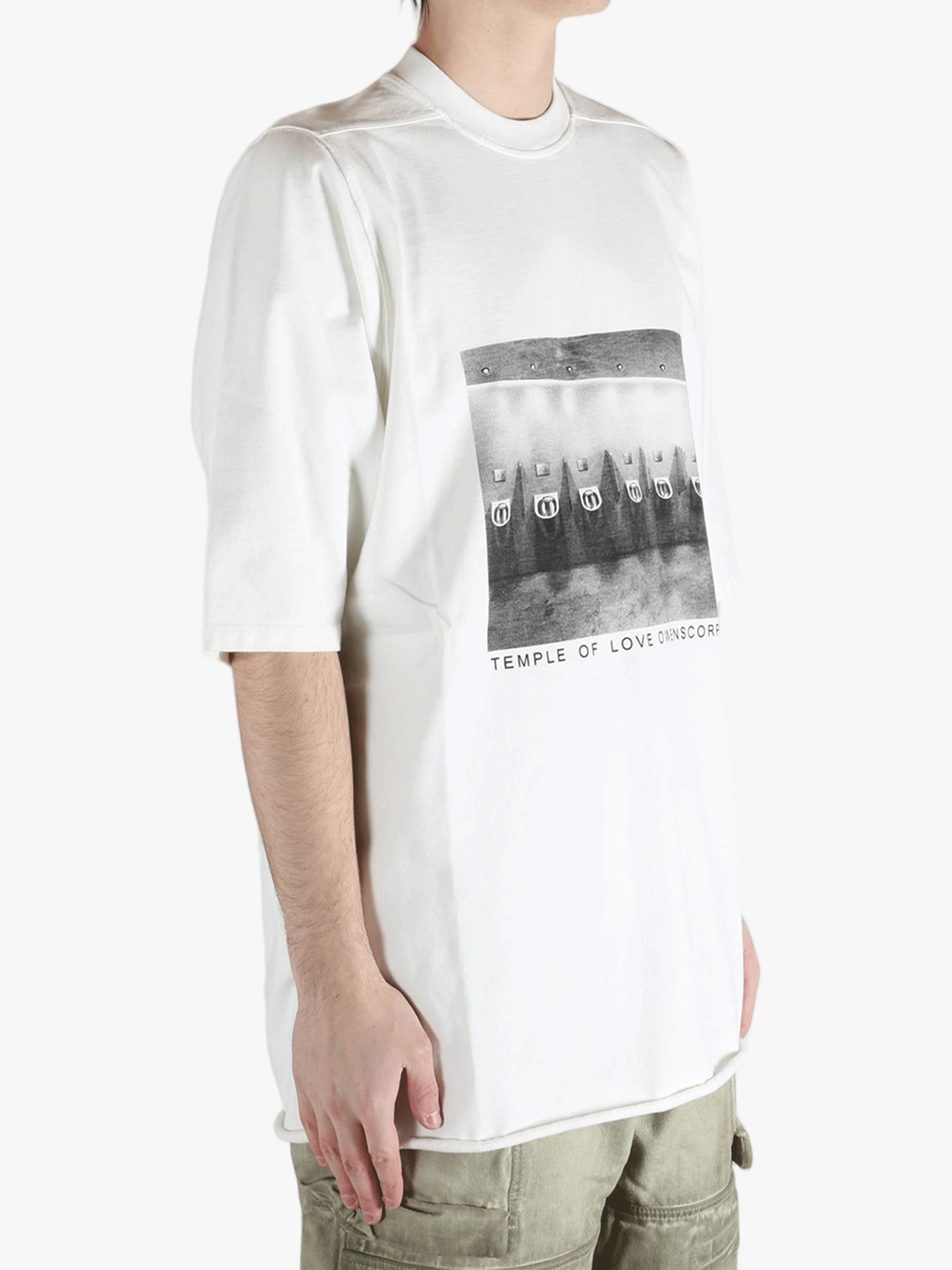 White t-shirt worn by a person, showing the t-shirt fit