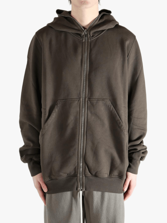 Brown hoodie worn by a person, showing the hoodie's fit