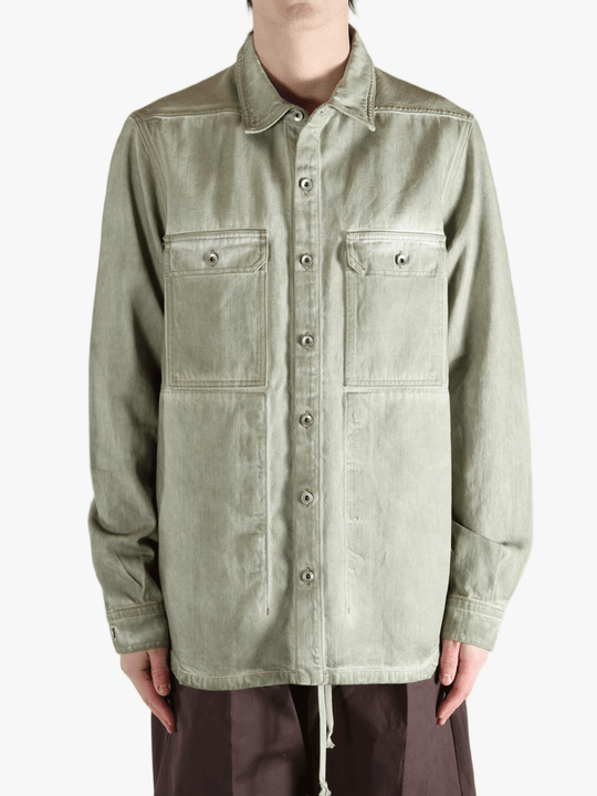 Green shirt worn by a person, showing the shirt's fit