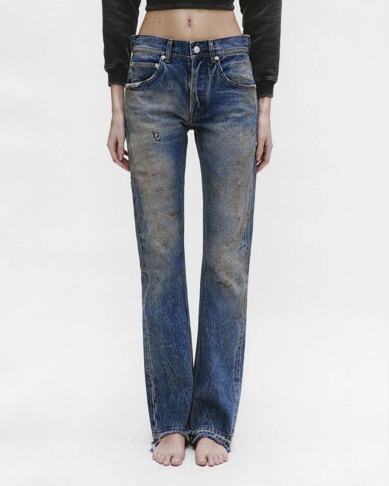 Blue pants worn by a person, showing the pants fit