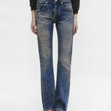Blue pants worn by a person, showing the pants fit