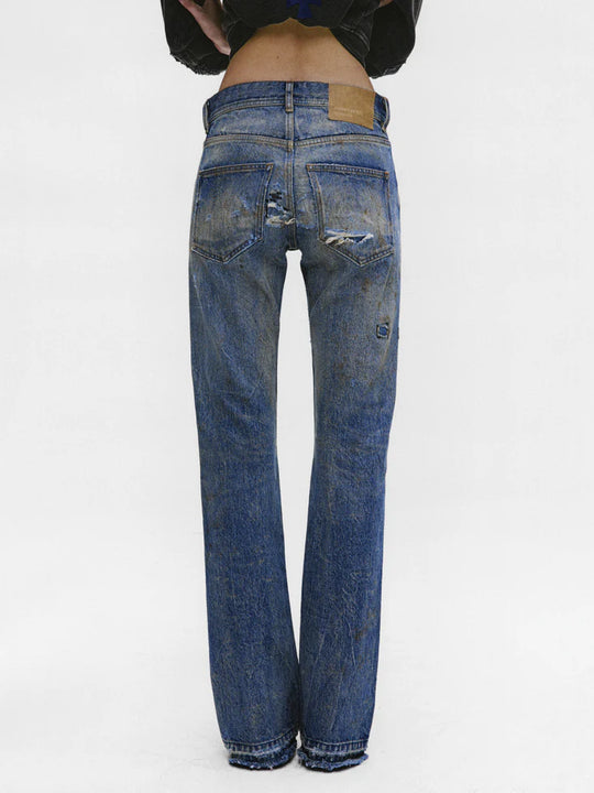 Blue pants worn by a person, showing the pants fit