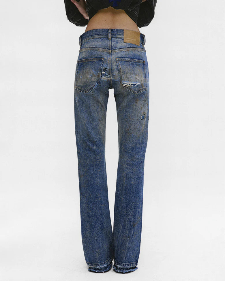 Blue pants worn by a person, showing the pants fit