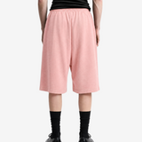 Pink shorts, full body view