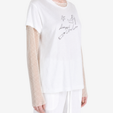 White t-shirt worn by a person, showing the t-shirt fit