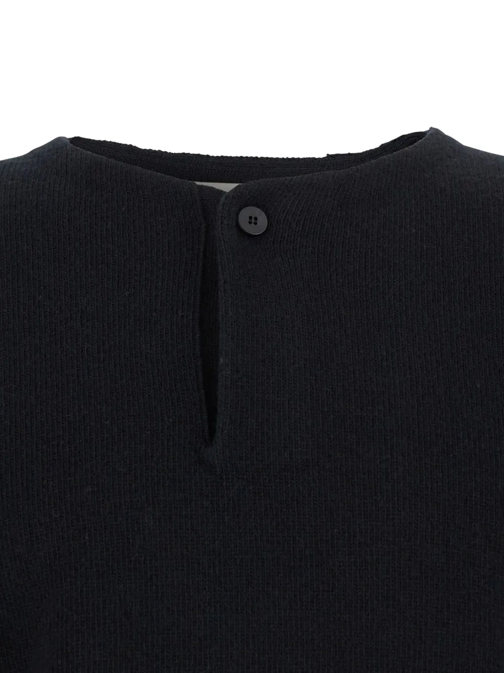 Close up of black sweater,showing texture of the wool fabric