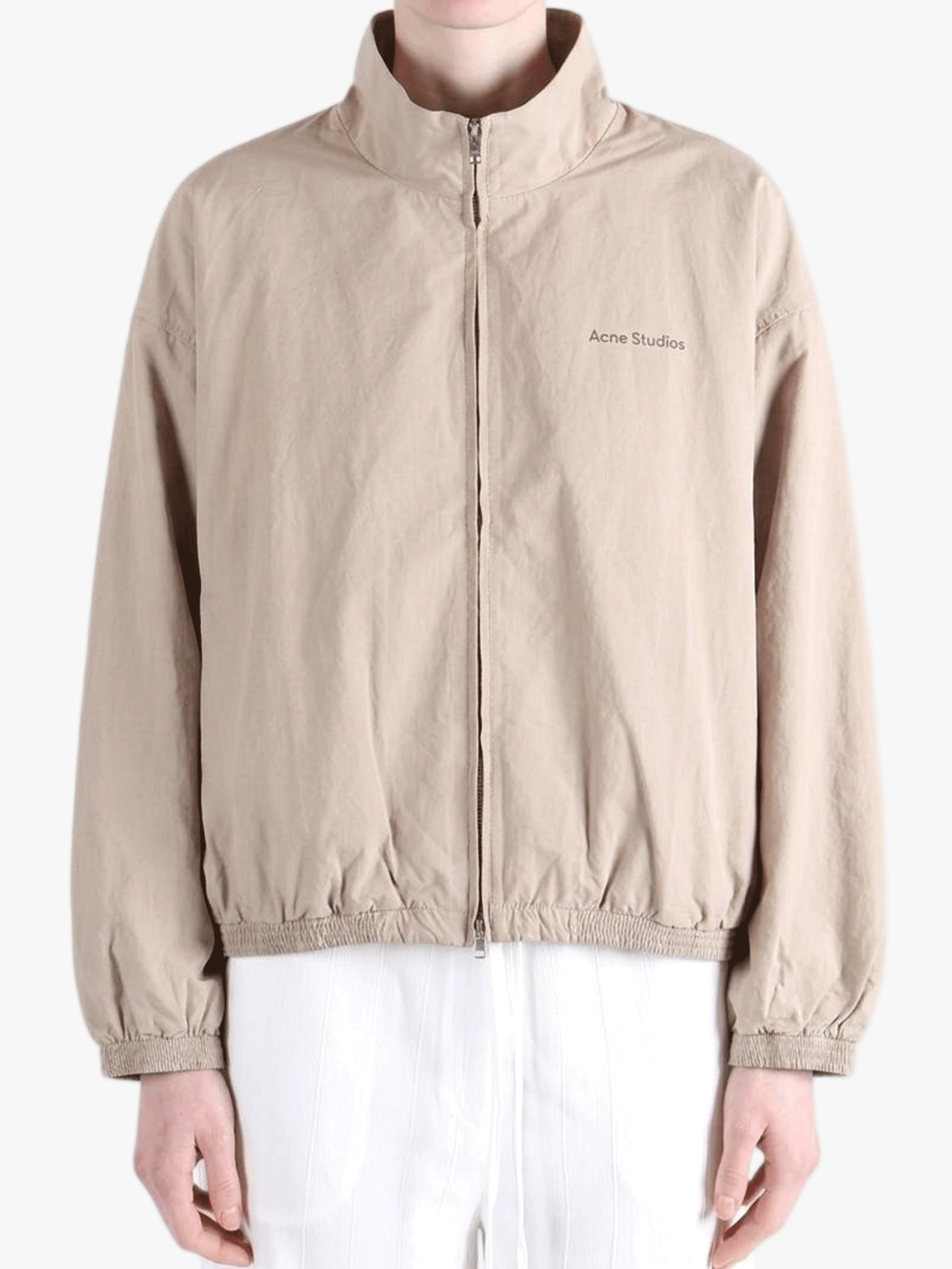 Tan jacket worn by a person, showing the jacket fit