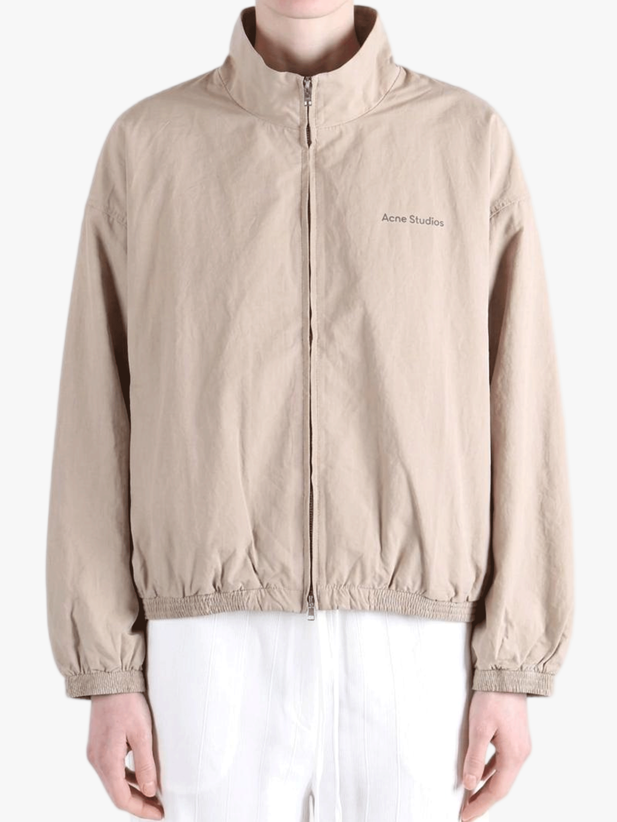 Tan jacket worn by a person, showing the jacket fit