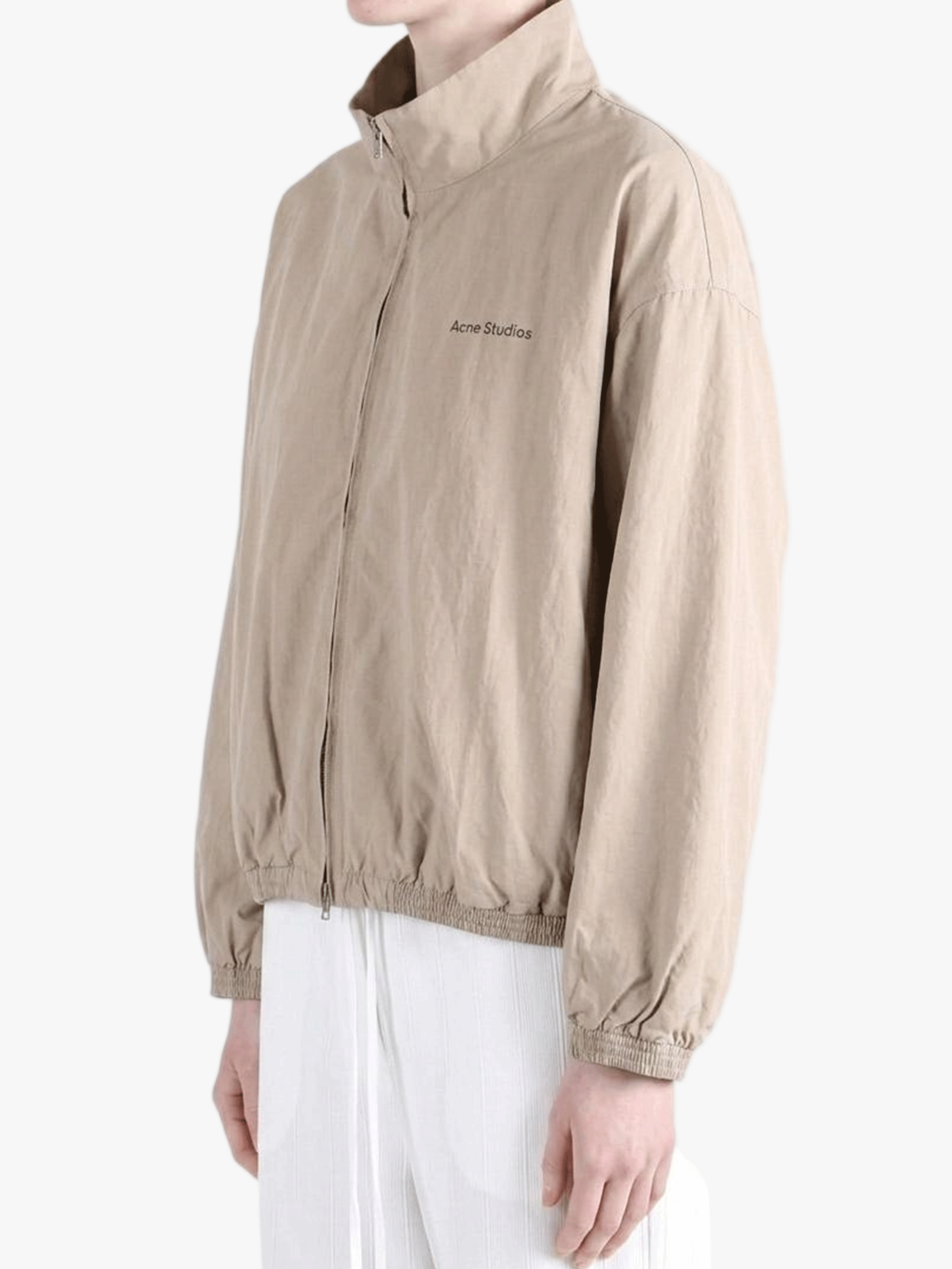 Tan jacket worn by a person, showing the jacket fit