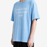 Blue t-shirt worn by a person, showing the t-shirt fit