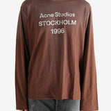 Brown shirt worn by a person, showing the shirt's fit