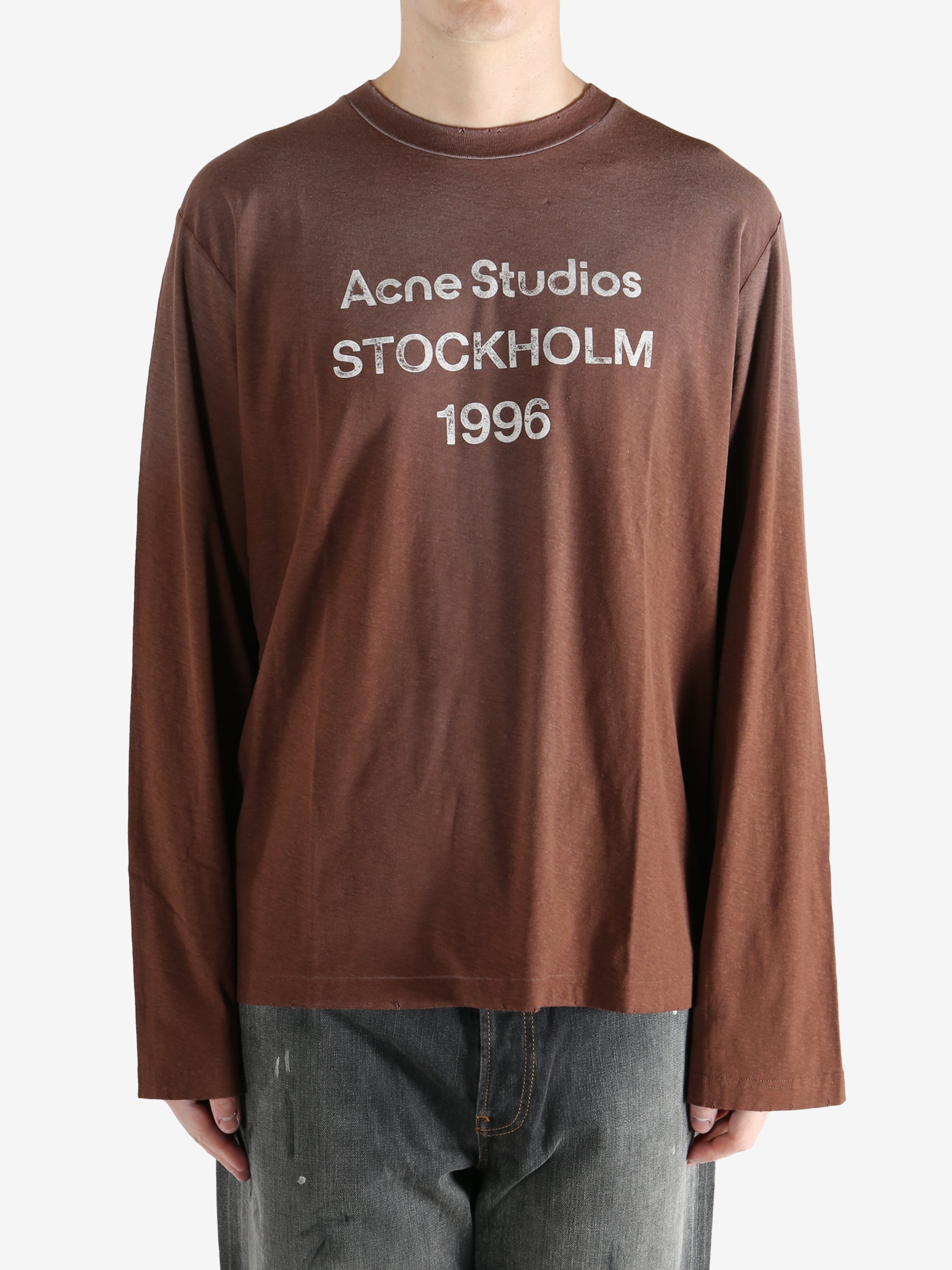 Brown shirt worn by a person, showing the shirt's fit