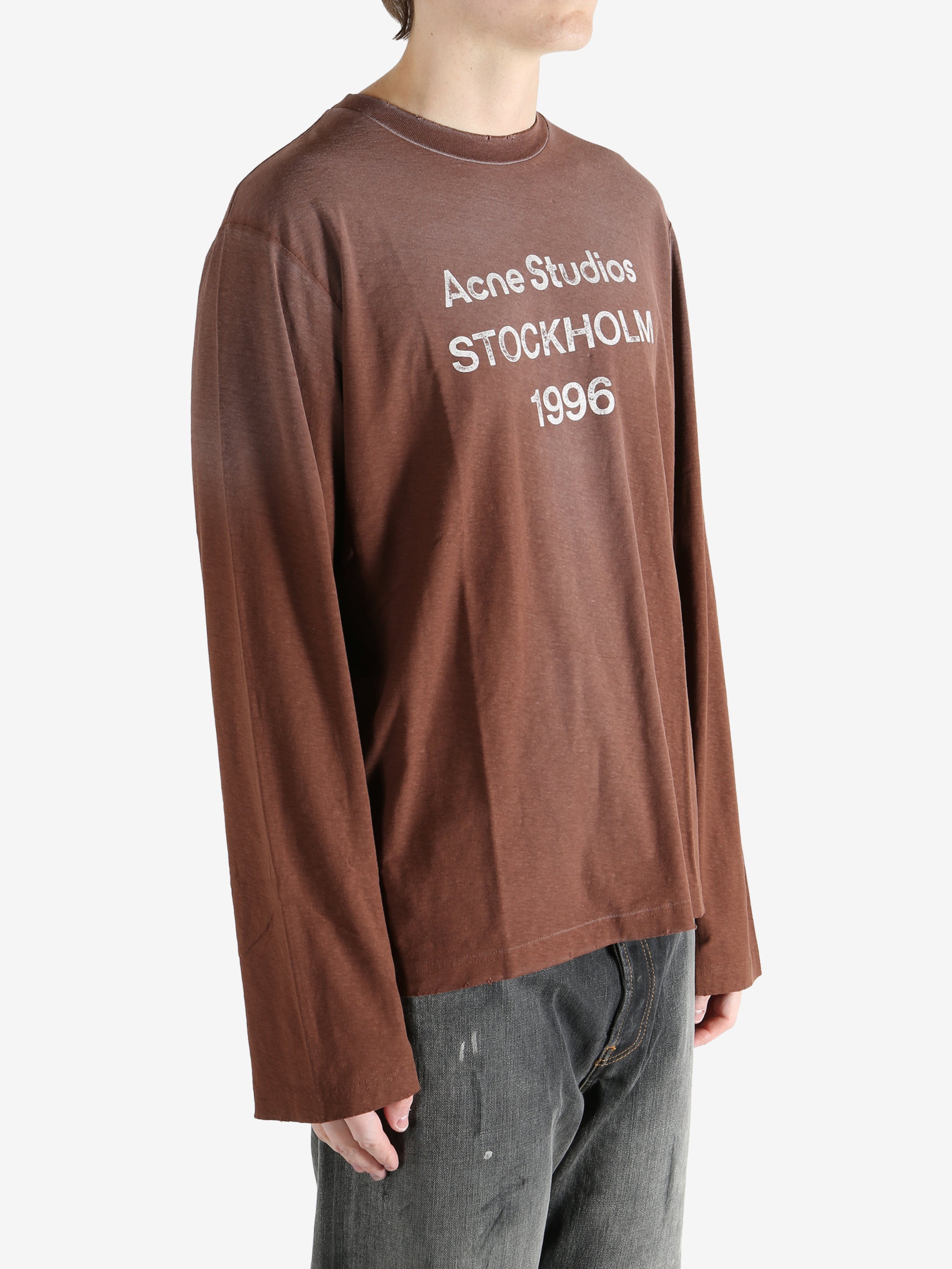 Brown shirt worn by a person, showing the shirt's fit