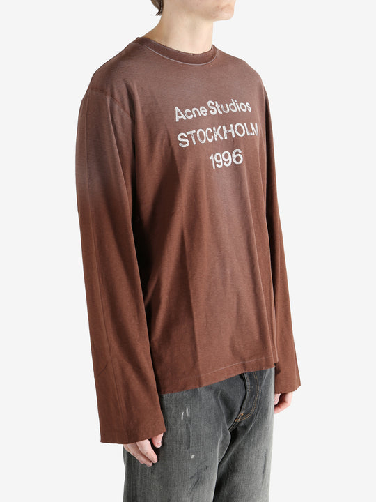 Brown shirt worn by a person, showing the shirt's fit