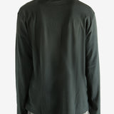 Black long-sleeve shirt worn by a person, showing the shirt fit