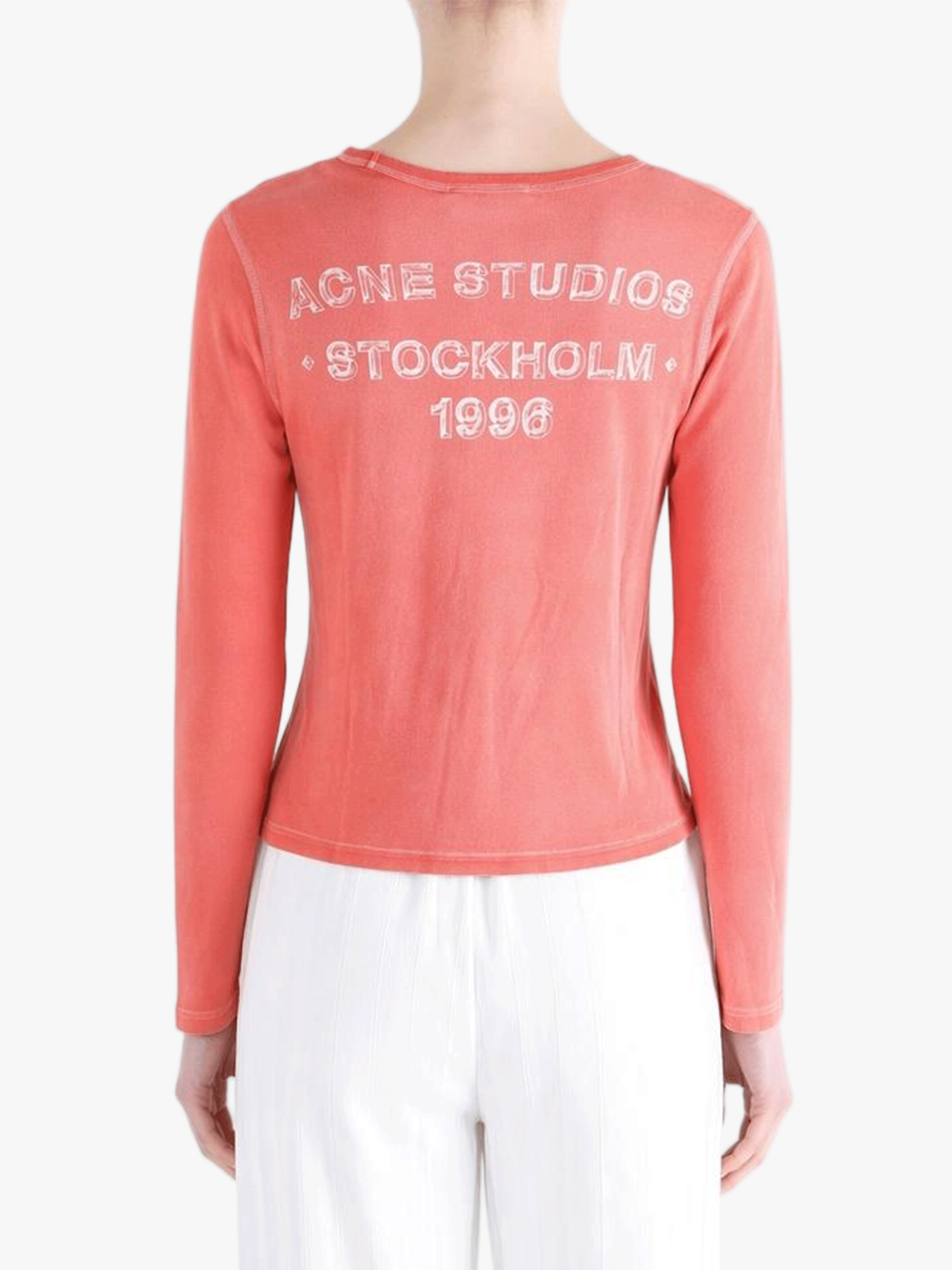 red tee worn by a person, showing the tee fit