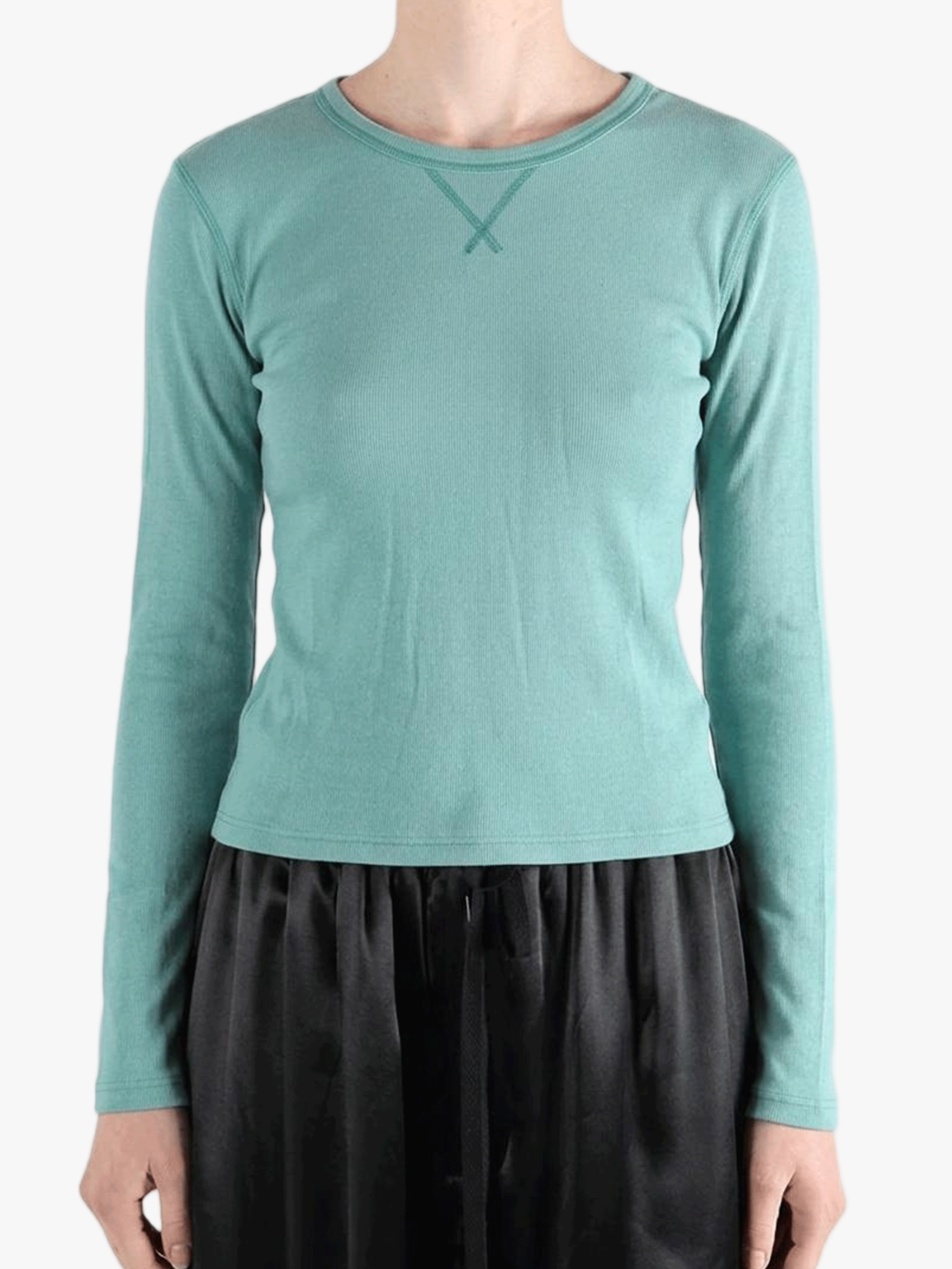 Green t-shirt worn by a person, showing the t-shirt fit