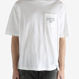 White t-shirt worn by a person, showing the shirt's fit