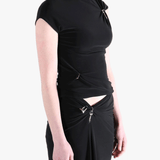 Black top worn by a person, showing the top's fit