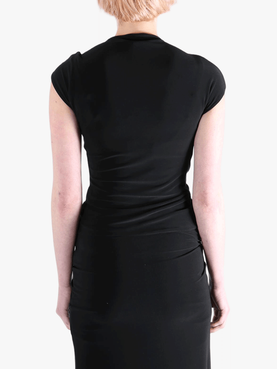 Black top worn by a person, showing the top's fit