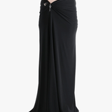 Black skirt worn by a person, showing the skirt fit