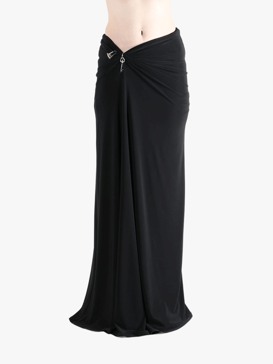 Black skirt worn by a person, showing the skirt fit