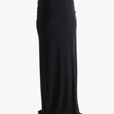 Black skirt worn by a person, showing the skirt fit