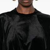 Close up of black shirt,showing texture of the cotton fabric.