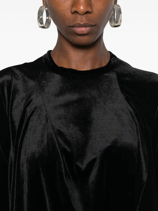 Close up of black shirt,showing texture of the cotton fabric.