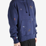 Navy hoodie worn by a person, showing the hoodie's fit