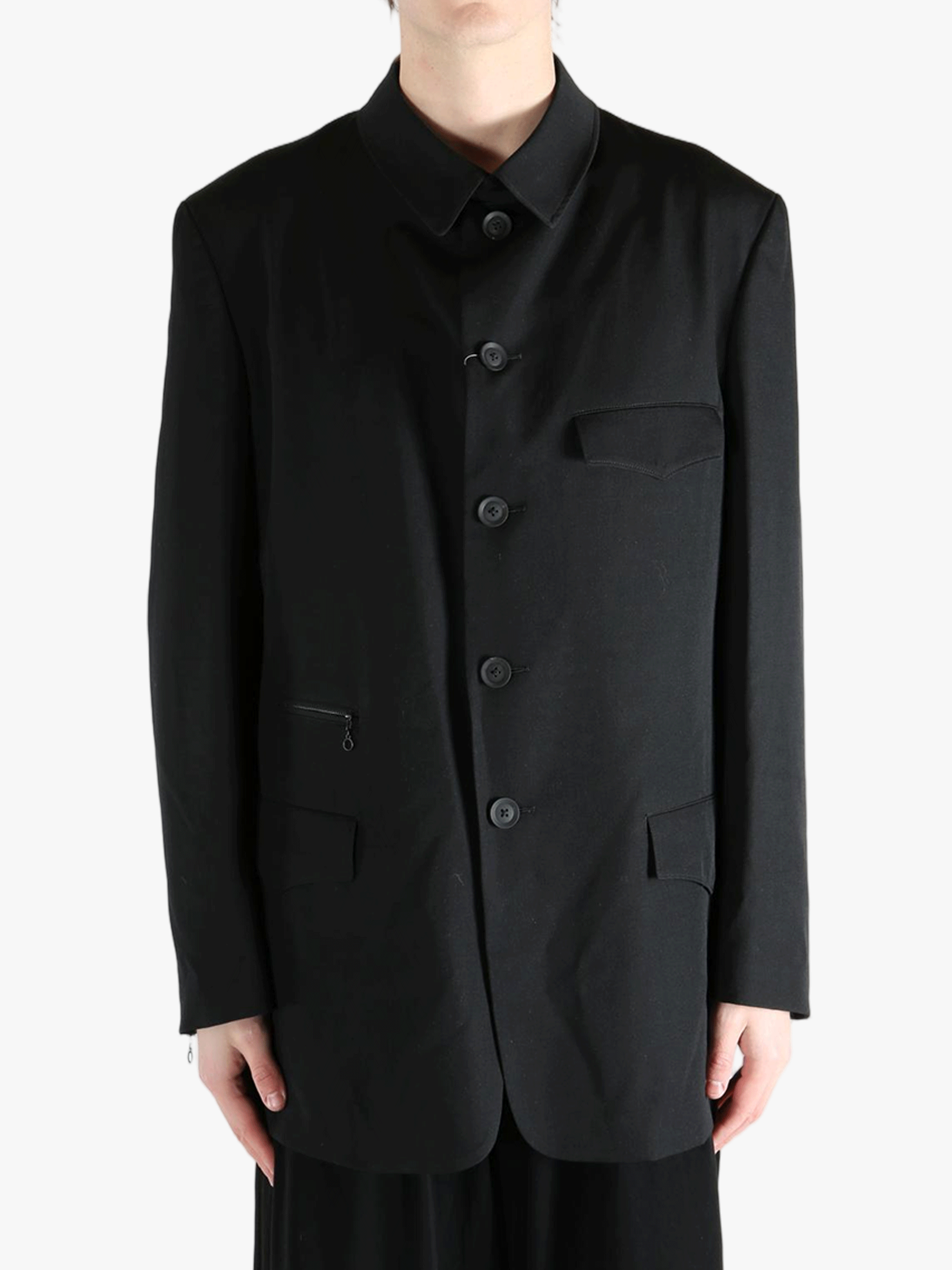 Black jacket worn by a person, showing the jacket's fit