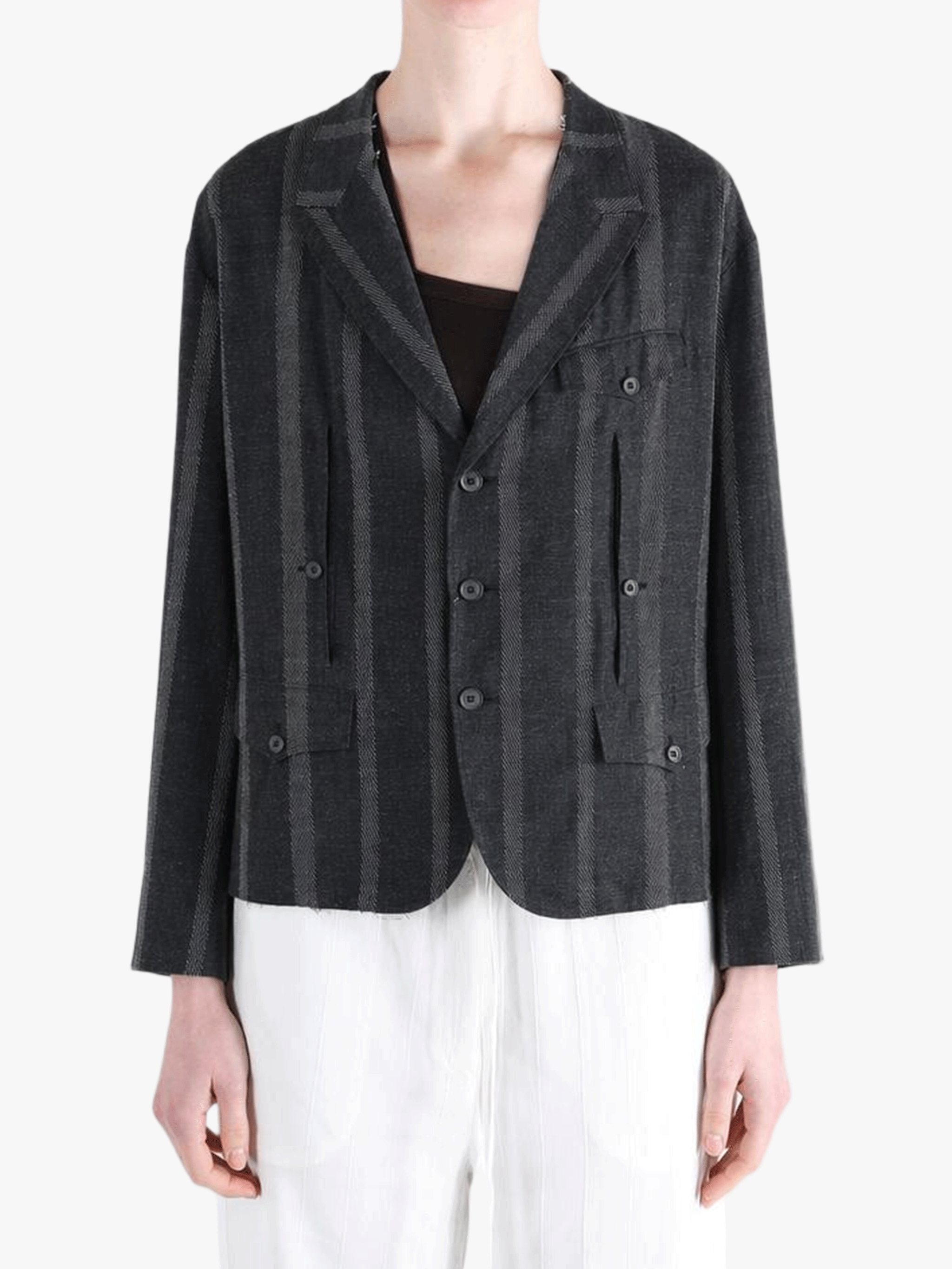 Black jacket-coat worn by a person, showing the jacket-coat's fit